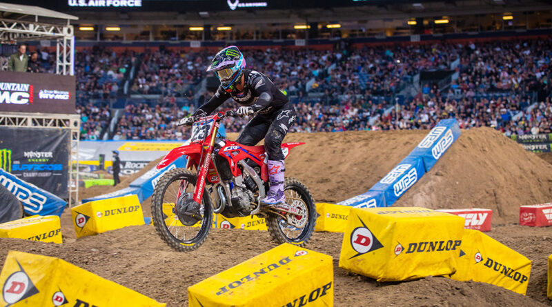 Chase Sexton navigating the track at the Denver AMA Supercross event