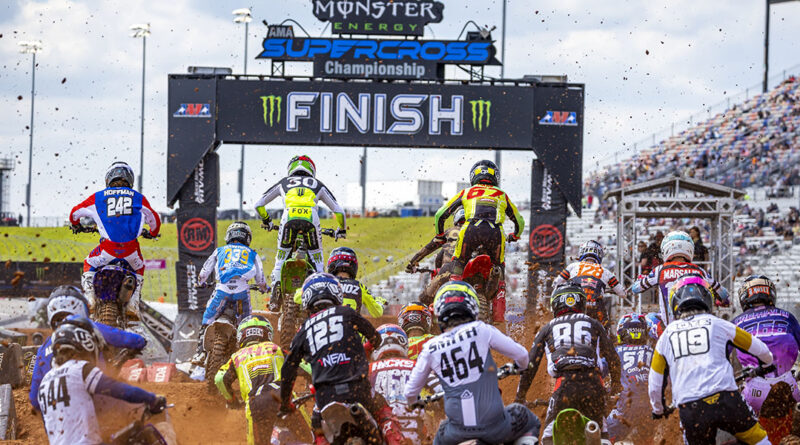 A pack of riders heading toward the conclusion of a lap at the Atlanta AMA Supercross event